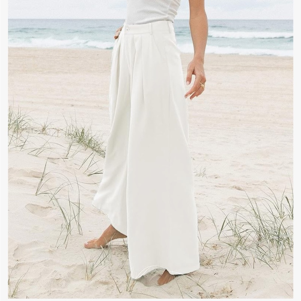 White Wide-leg trousers with pockets. High-waist palazzo pants